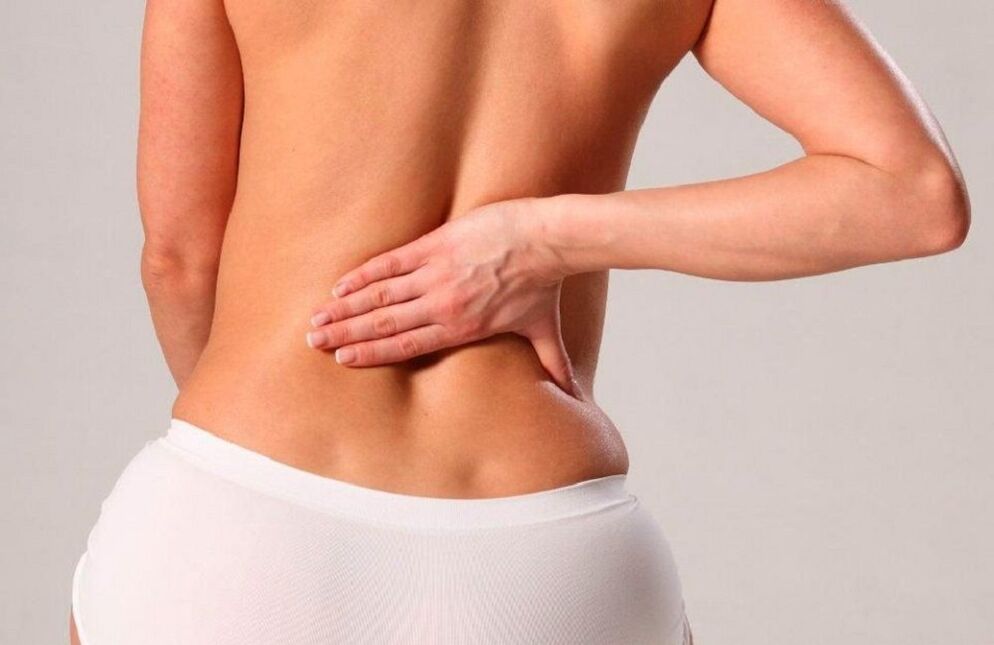 back pain in the lumbar region photo 2